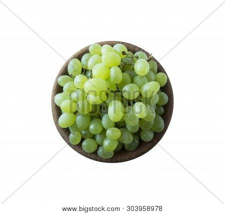 Green Grapes Kishmish Isolated On White. Top View. Grapes In A Wooden Bowl Isolated On White Backgro