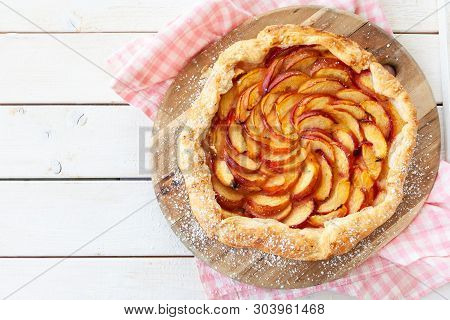 Homemade Peach Pie Made With Flakey Puff Pastry