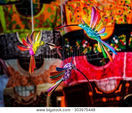 Colorful Wooden Hummingbirds Textiles Handicrafts Red Blue Pink Yellow Oaxaca Mexico.
