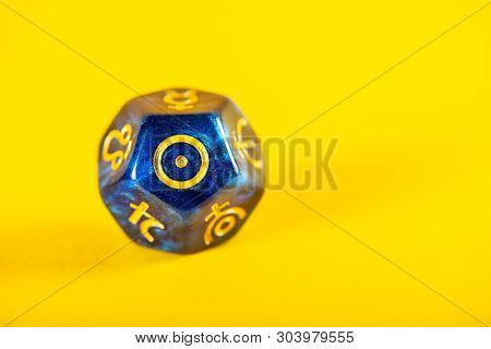 Astrology Dice With Symbol Of The Sun On Yellow Background