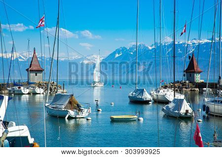 Picturesque Little Port And Sailing Boats On Lake Geneva In Morges