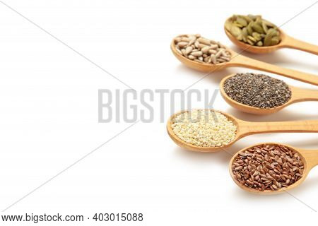 Healthy Superfood: Sesame, Pumpkin Seeds, Sunflower Seeds, Flax Seeds And Chia Isolated On White. To