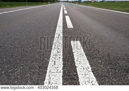View Of An Asphalt Road, Backgroundm Traveling, White Lanes