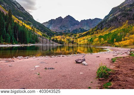 Maroon Bells At Autumn Season In In Aspen Colorado, Usa.