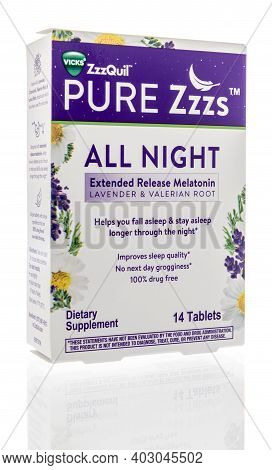 Winneconne, Wi -4 January 2021: A Package Of Vicks Zzzquil Pure Zzza Nighttime Sleep Aid On An Isola
