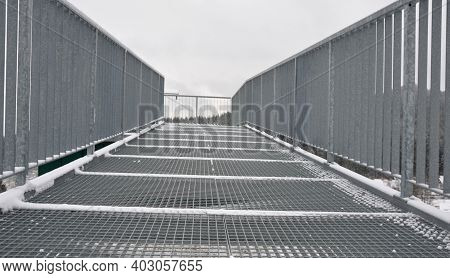 Gray Snow-covered Staircase Observation Deck Construction With High Resistance To Deformation Even U