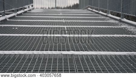 Gray Snow-covered Staircase Observation Deck Construction With High Resistance To Deformation Even U