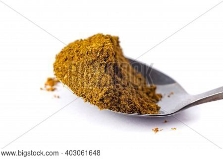Pile Of Khmeli Suneli On A Spoon Isolated On White. Georgian Food Condiments