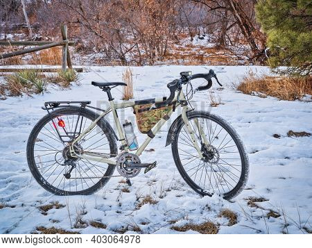 touring bicycle at dusk in late fall or winter scenery on a bike trail in Fort Collins, northern Colorado, recreation and commuting concept