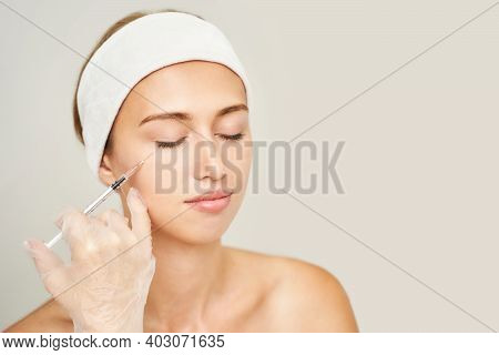 Cheek Injection At Spa Salon. Doctor Hands. Pretty Female Patient. Beauty Treatment. Healthy Skin Pr