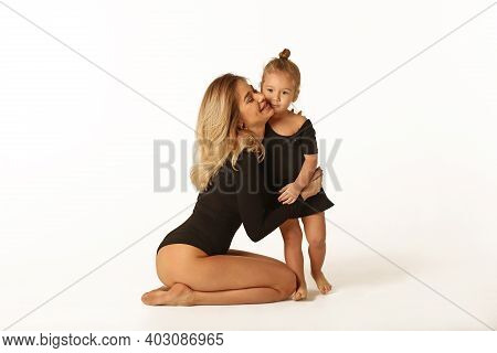 Cute Baby Girl And Mum In Black Body Having Fun Full Body Studio Portrait