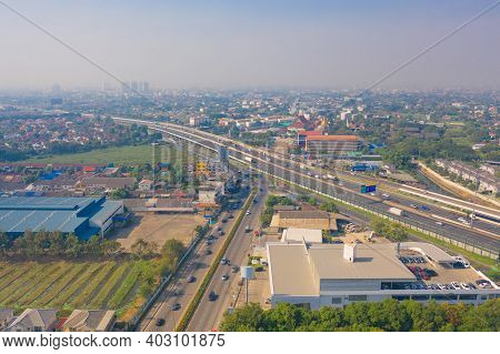 Aerial View Of Cars Driving On Highway Or Moterway. Overpass Bridge Street Roads In Connection Netwo
