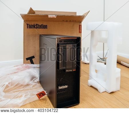 Paris, France - Nov 25, 2020: Unboxing Process Of New Lenovo Thinkstation P620 Workstation First In 