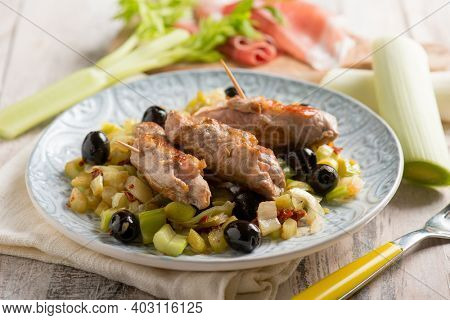 filled rolls with ham leek and black olives