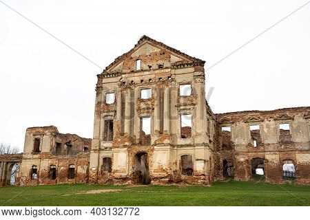 Ruzhansky Palace And The Ruins Of The Facade Of An Abandoned Ruined Building Of An Ancient Castle Of