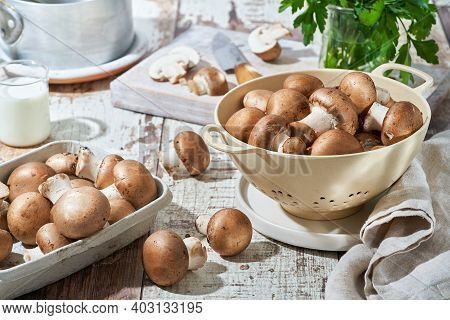 Raw Mushrooms Portobello Champignon, Sustainable, Compostable Packaging, On Wooden Background, Space