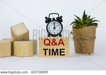 Q And A, Questions And Answers Time Symbol. Concept Words 'q And A Time' On Wooden Blocks On A Beaut