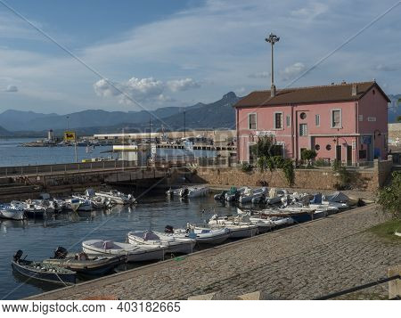 Arbatax, Sardinia, Italy, September 9, 2020: View Of Arbatax Harbour, Port With Ships, Fishing Boats