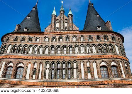 The Holsten Gate Holstentor In Luebeck, Germany. It Is The Most Significant Gate Of The Middle Ages 