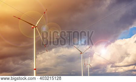 Wind Turbines Farm At Sunset  ,      Background Of The Work