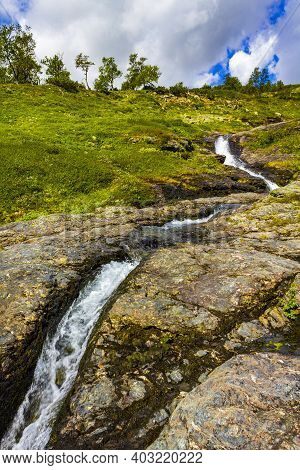 Running Water Of A Beautiful Waterfall River, Vang, Norway.