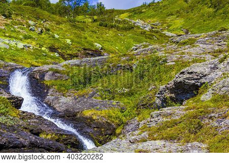 Running Water Of A Beautiful Waterfall River, Vang, Norway.