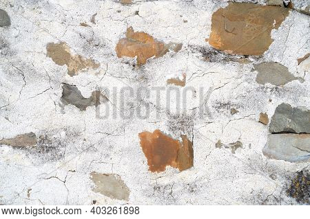 Abstract Old Beton And Stones Texture Wall Outdoor. Textured Grunge Background. High Quality Photo