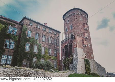 Medieval Sandomierska Tower And Building Is An Old Austrian Hospital On A Wawel Hill As Part Of The 
