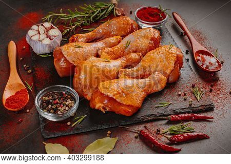 Top View.convenience Food,pree Cooked.marinated Chicken Drumstick Black Background Raw Chicken Meat 