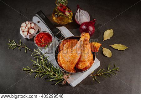 Top View.convenience Food,pree Cooked.marinated Chicken Drumstick Black Background Raw Chicken Meat 