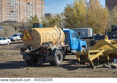 Kazakhstan, Ust-kamenogorsk - 15 October, 2020. Water Tanker Gaz 53 On The Construction Site.