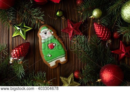 Bear Gingerbread Cookie On Wooden Table. Top View. New Year And Christmas Celebration Concept. Top V