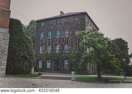 Medieval Sandomierska Tower And Building Is An Old Austrian Hospital On A Wawel Hill As Part Of The 