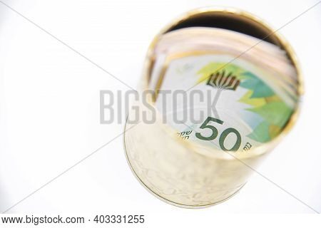 Metal Piggy Bank With New Israel Shekel Symbols For Saving Money. On A White Background With Nis Ban