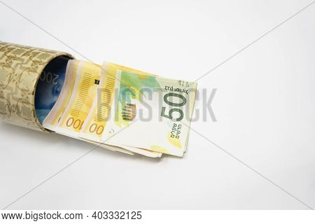 Metal Piggy Bank With New Israel Shekel Symbols For Saving Money. On A White Background With Nis Ban