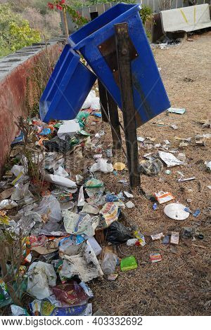 Pile Of Trash Lying Outside A Bin. Pollution Environment Disaster. People Are Not Using Dustbins. Hu