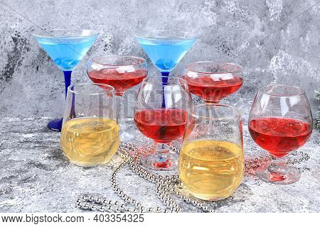 Assortment Of Alcoholic Cocktail With Lemonade, Wine, Champagne, Grog Or Martini In Glasses On A Gra