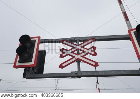 Ungated Railroad Crossing With Level Crossing Sign