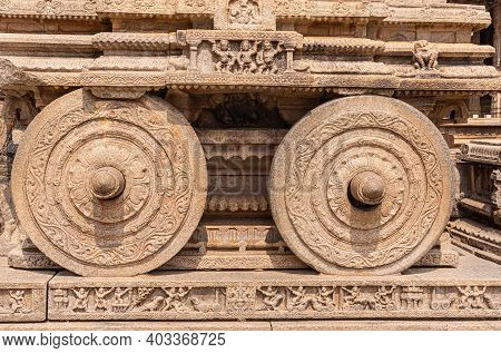 Hampi, Karnataka, India - November 5, 2013: Vijaya Vitthala Temple. Closeup Of Sculpted Wheels Of Be