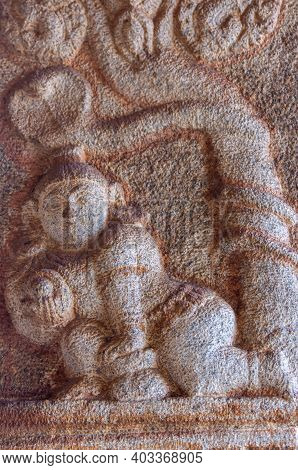 Hampi, Karnataka, India - November 5, 2013: Vijaya Vitthala Temple. Closeup Of Red-gray Stone Fresco