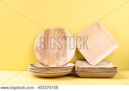 Betal Palm Leaf Plate (biodegradable, Compostable, Disposable Or Eco Friendly Plate) On Yellow Backg