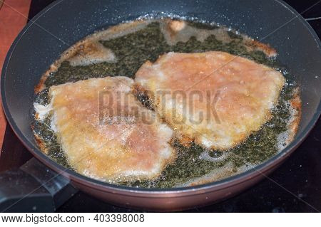 Frying Kotlet Schabowy, Polish Variety Of Pork Breaded Cutlet