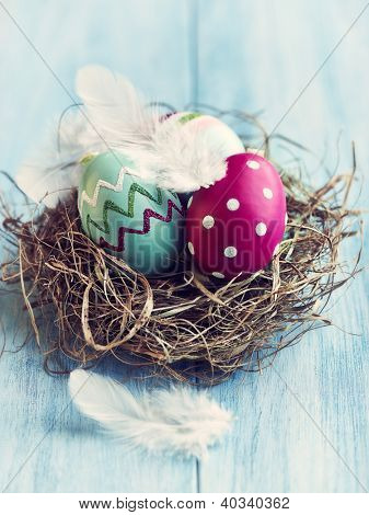 Colorful easter eggs in a nest