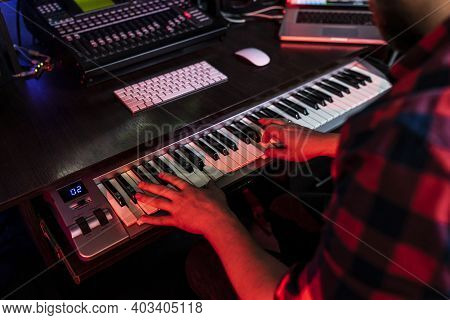 White Man Compositor Is Playing On Keyboard In The Record Studio For Radio Fm