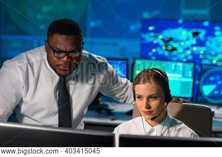 Workplace Of The Air Traffic Controllers In The Control Tower. Diverse Team Of Aircraft Control Offi