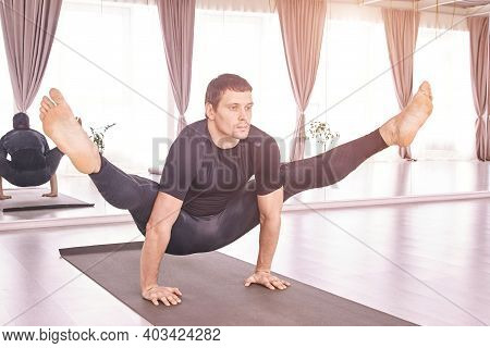 Male Person Do Yoga Class Exercise. Meditation In Calm. Advansed Studio Workout. Man Lifestyle. Guy 