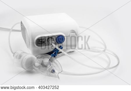Ultrasonic Inhaler Or Nebulizer. Respiratory Medicine. Asthma Breathing Treatment With Oxygen Mask, 
