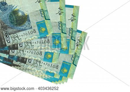 500 Kazakhstani Tenge Bills Lies In Small Bunch Or Pack Isolated On White. Mockup With Copy Space. B