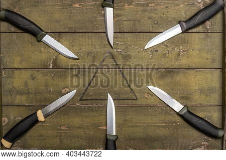 Lots Of Knives Aimed At The Center. Knives Aiming To The Center.