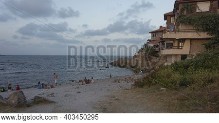 Bulgaria, Sozopol - 2018, 03 September: Evening Swimming On A Wild Beach. Stock Photo.